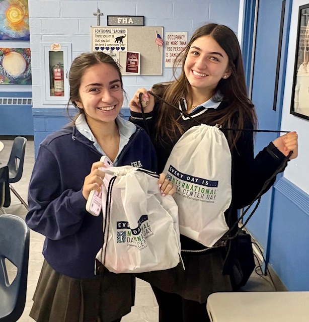 Students with Swag drawstring bags